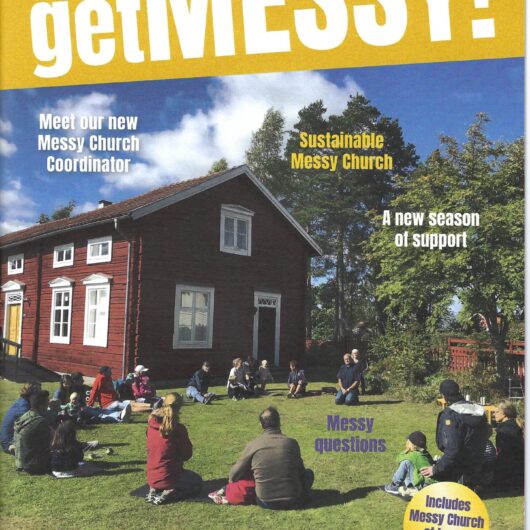 The cover of a sample of Messy Church Magazine with a cover photo of all ages enjoying outdoors together